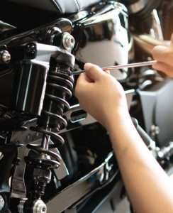 NFS Auto Tech Replacing Old Suspensions on a Car